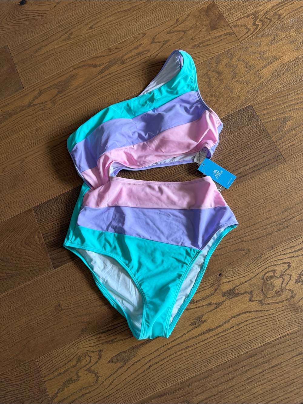NWT. Cupshe. One-Shoulder Stripe Swimsuit in Teal, Pink & Lavender
